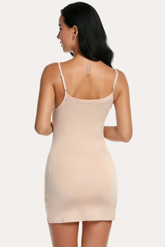Beige Avidlove full slip mini dress. Adjustable straps, sexy and flattering, perfect for confidence.