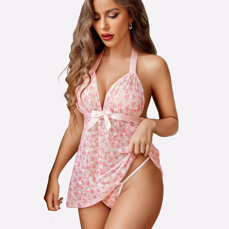 Pink sheer floral halter babydoll lingerie set with bow. Romantic and lightweight nightwear.