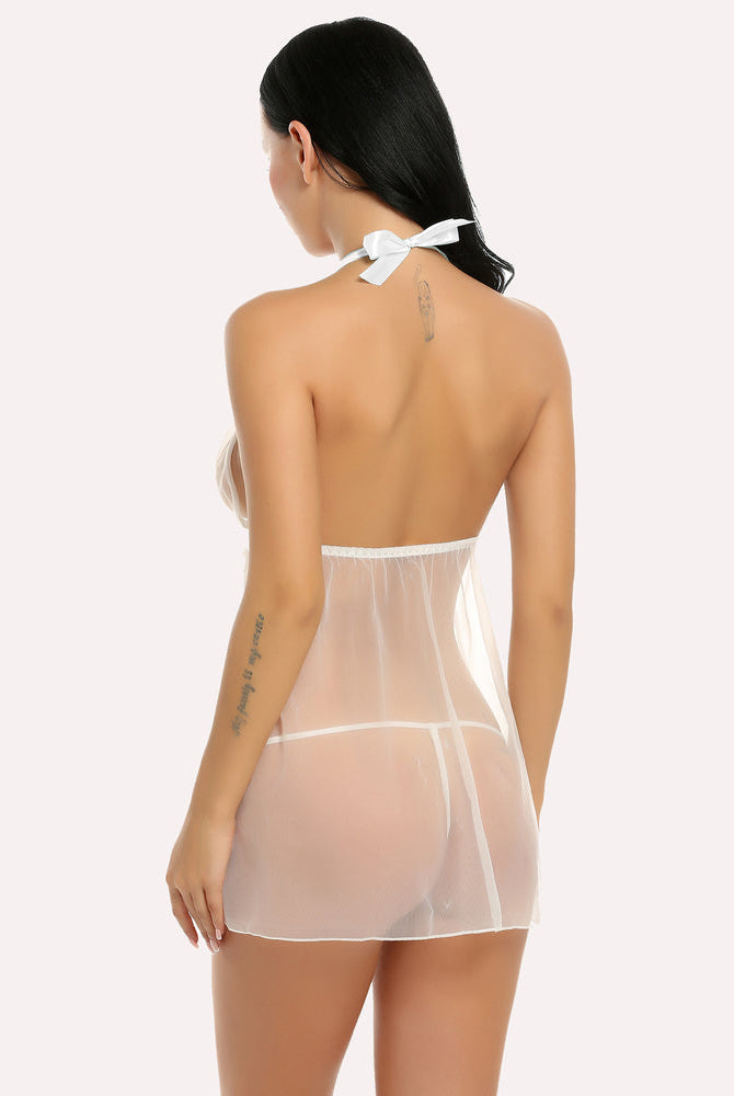 White sheer mesh halter babydoll lingerie set with bow detail; sensual and romantic design