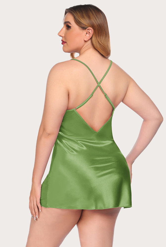 Green satin sleep dress with adjustable straps, low back detail on plus-size model. Sexy nightwear.
