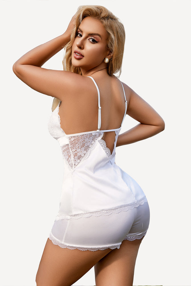 White satin lace pajamas set for women with adjustable straps, floral trim, and shorts.