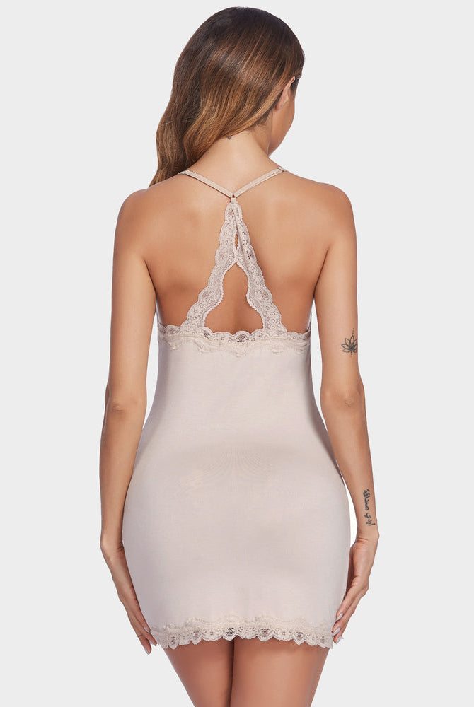 Beige full slip chemise dress with lace trim, slim fit, and spaghetti straps, back view
