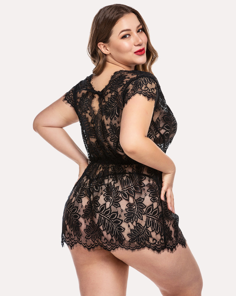 Plus size model in black lace babydoll chemise, perfect for bridal lingerie or a romantic night.