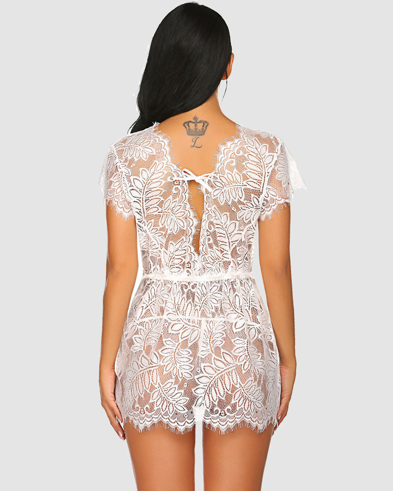 White lace chemise romper with deep V-neck, eyelash trim and floral lace. Romantic sexy lingerie.