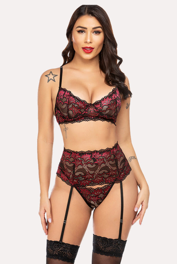 Red lace lingerie set with garter belt. Designed for confidence and romantic nights for women.