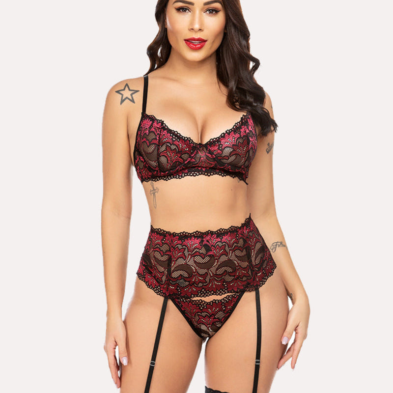 Red lace lingerie set with garter belt. Designed for confidence and romantic nights for women.