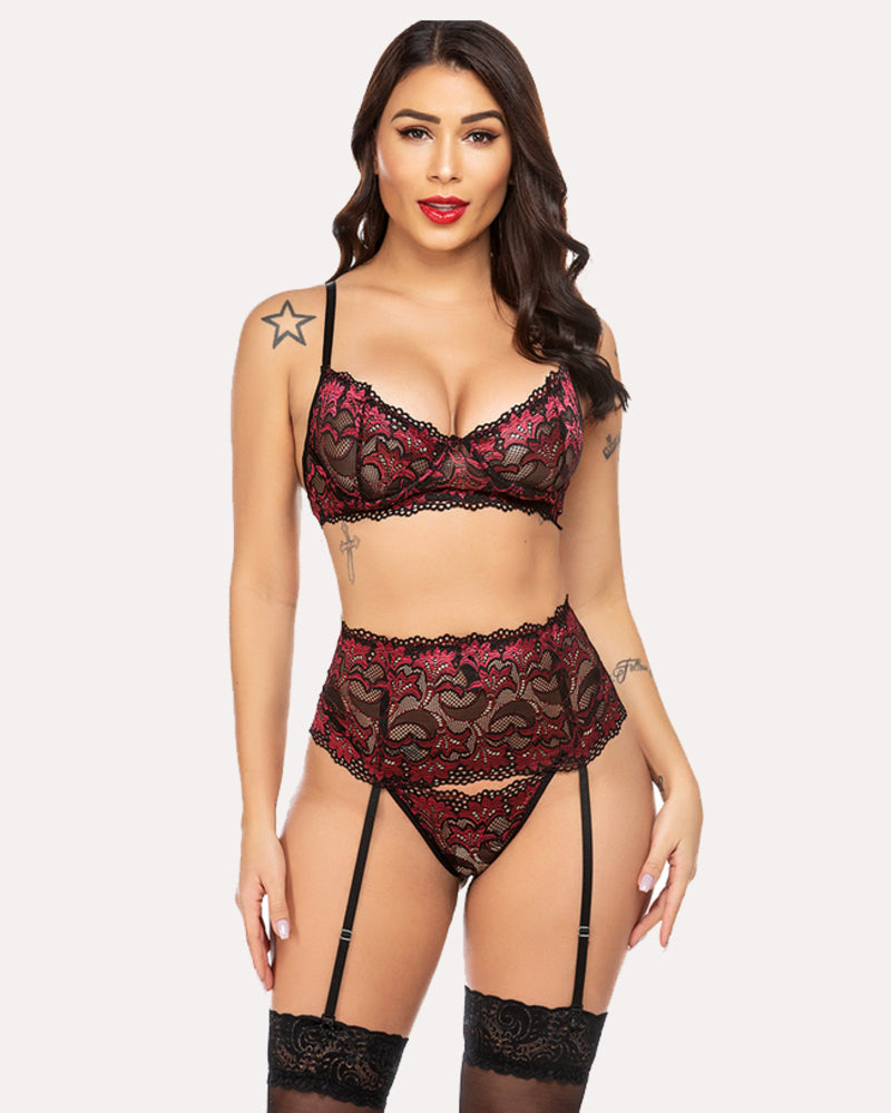 Red lace lingerie set with garter belt. Designed for confidence and romantic nights for women.