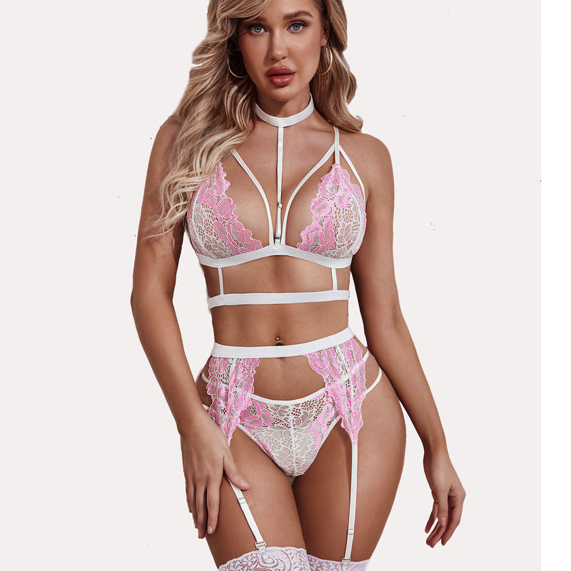 White and pink lace bra and panty set with adjustable straps, suspender belt, and choker