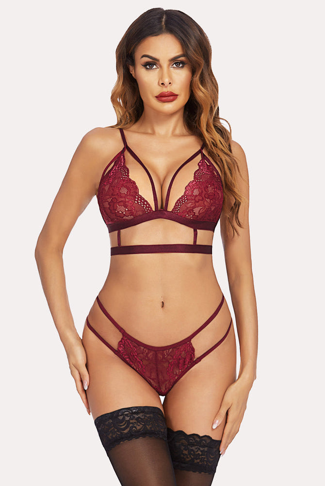 Burgundy lace bra and panty set with strappy details and removable choker. Sexy lingerie for women.