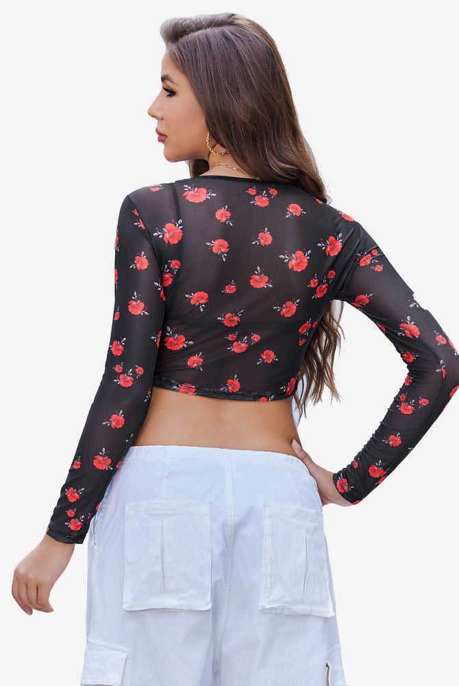 Black mesh crop top with red floral design and long sleeves, sheer style