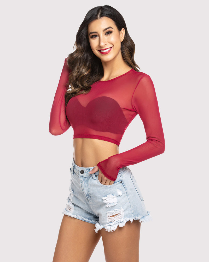 Red mesh crop top and denim shorts, sheer long sleeve shirt. Confident model in lingerie