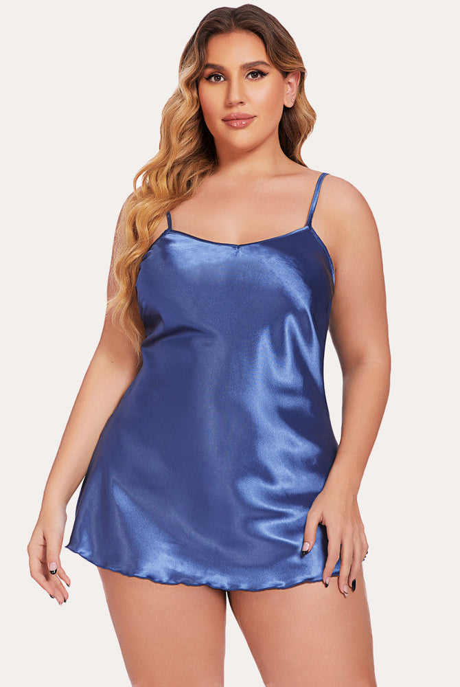 Plus-size model in blue satin mini slip nightgown with adjustable straps, silky lingerie