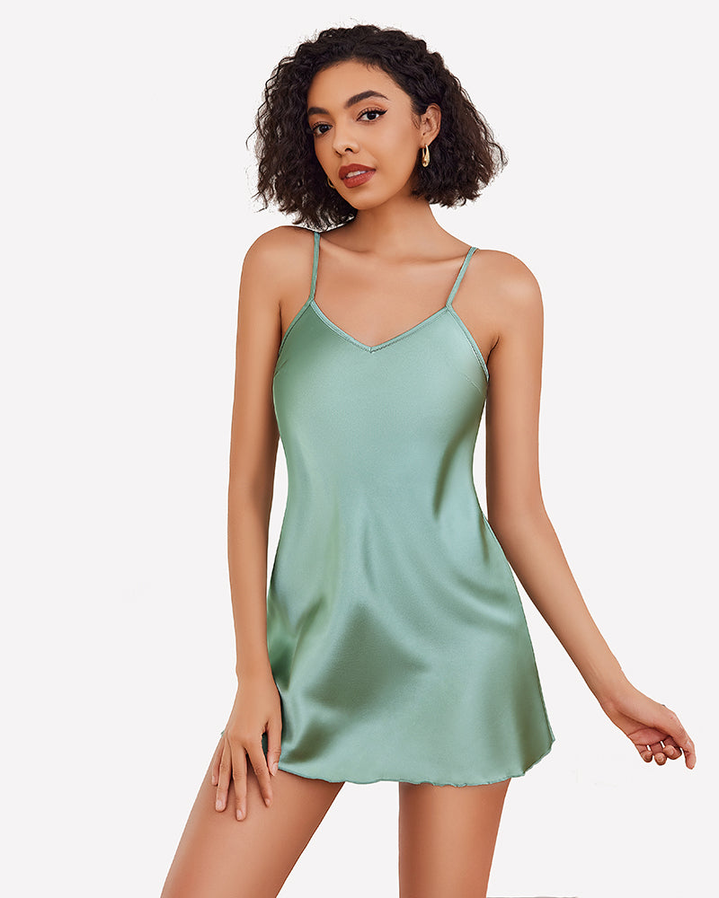 Mint green satin slip nightgown with adjustable straps, confident woman's lingerie, silky fabric.