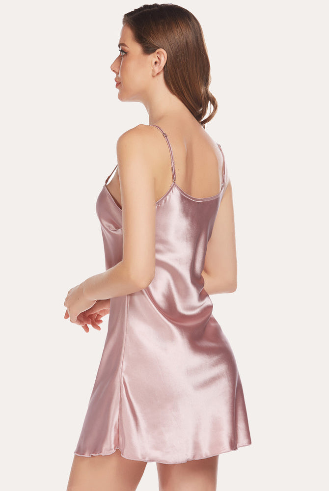 Pink satin mini slip nightwear. Adjustable straps, silky and smooth fabric