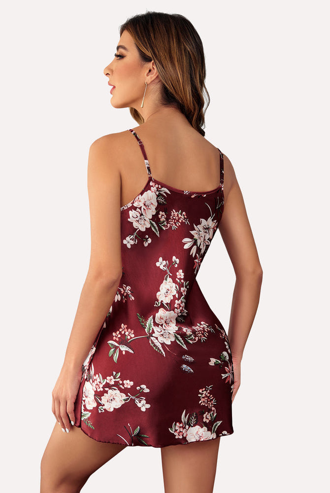 Floral satin mini slip nightwear in burgundy with floral print; adjustable straps; comfortable fit.