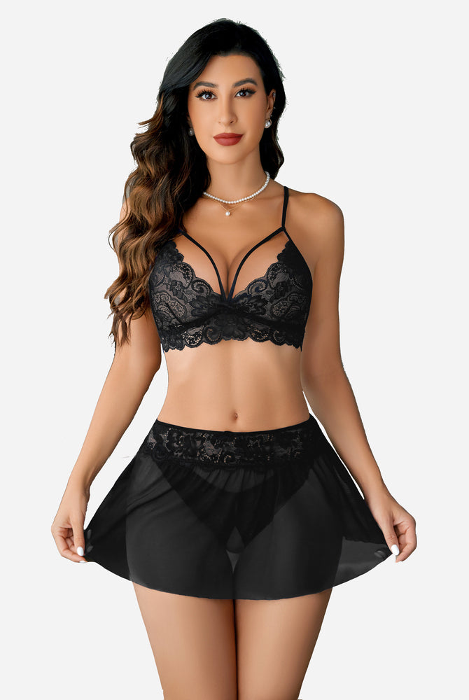 Black lace bralette and skirt lingerie set with lace trim. Perfect for intimate moments.
