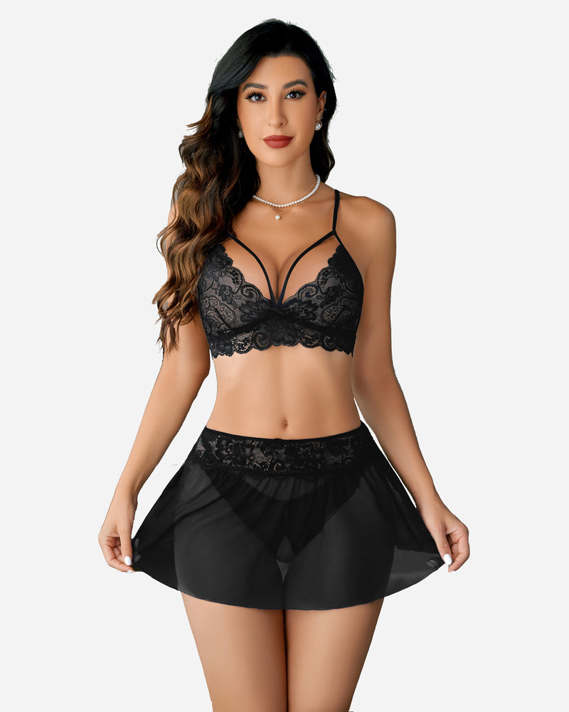 Black lace bralette and skirt lingerie set with lace trim. Perfect for intimate moments.
