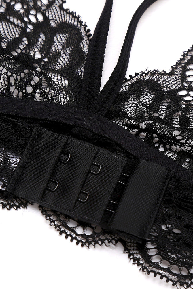 Black lace bralette with hook closure and delicate lace trim. Perfect for intimate moments.