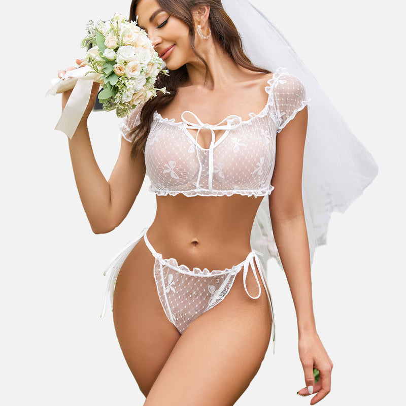 White lace bridal lingerie set with ruffle crop top, bow and tie sides. Perfect for the bride.