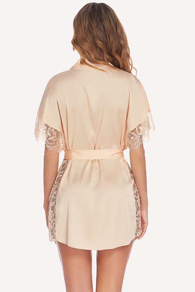 Peach satin kimono robe with eyelash lace trim, side split, and waist tie. Luxurious lingerie.