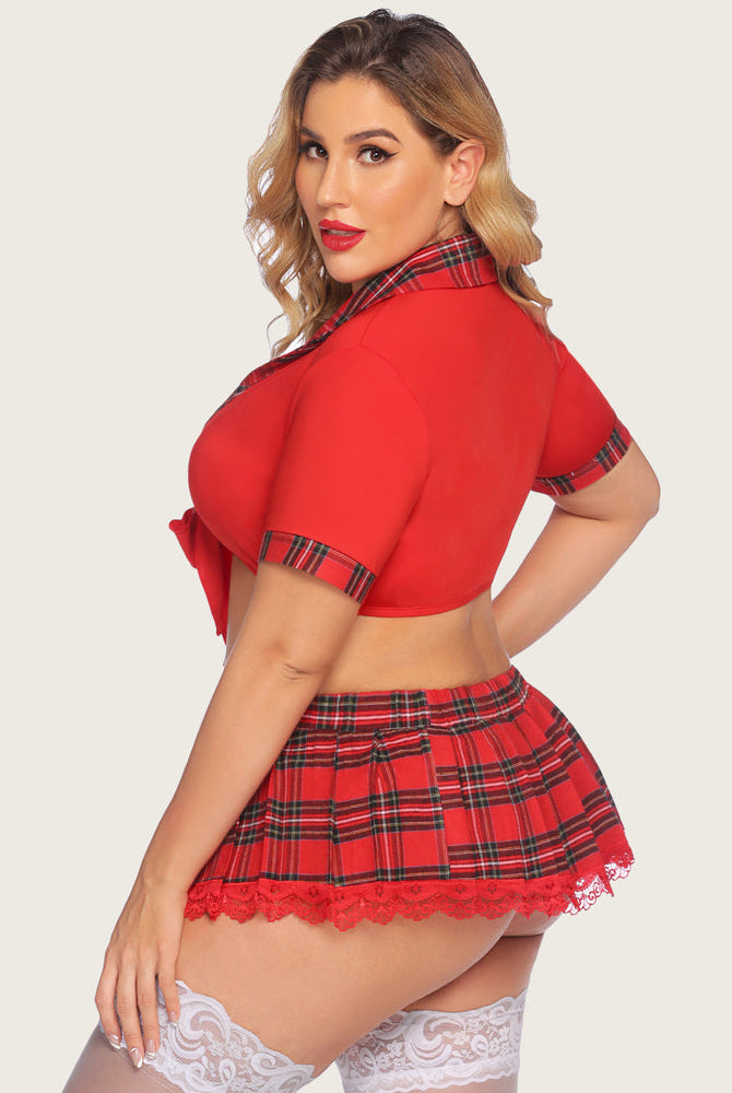 Plus size schoolgirl lingerie set: red tie top, plaid mini skirt, lace trim, thigh-highs.
