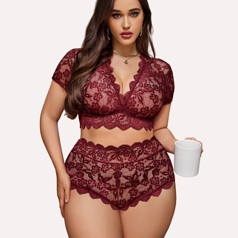 Burgundy floral lace plus size lingerie set: deep V bra and shorts, model holding a mug.