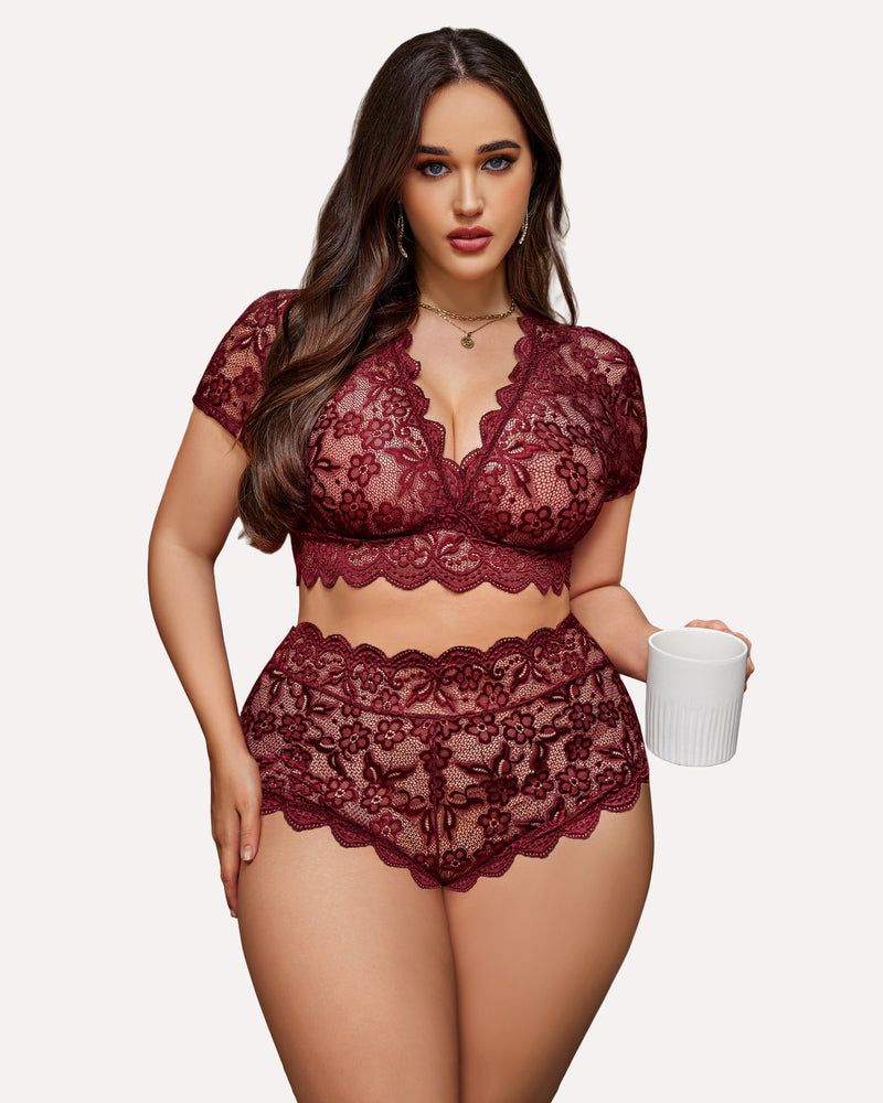 Burgundy floral lace plus size lingerie set: deep V bra and shorts, model holding a mug.