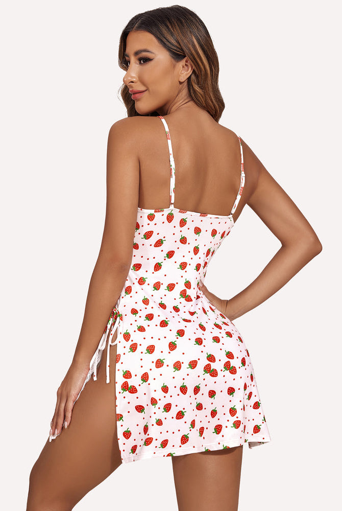 White strawberry print satin nightie, lace trim, side slit, thong. Playful, sexy lingerie.