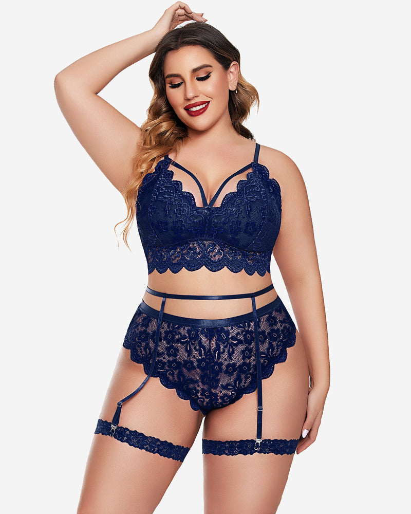 Plus size navy blue lace lingerie set: bralette, panties, garter belt. Sexy floral design.