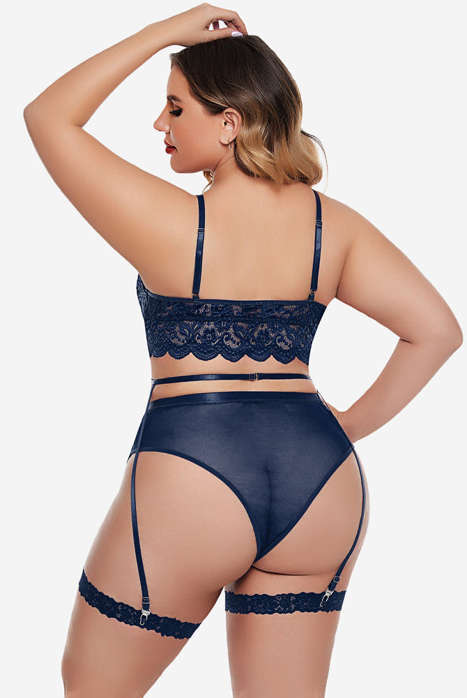 Plus size navy blue lace lingerie set: bralette, high-waisted panties, garter belt; floral lace.