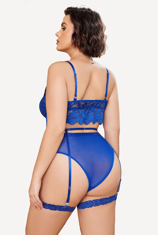 Royal blue lace lingerie set for plus size. Bralette, panties, garter belt; floral lace detail.