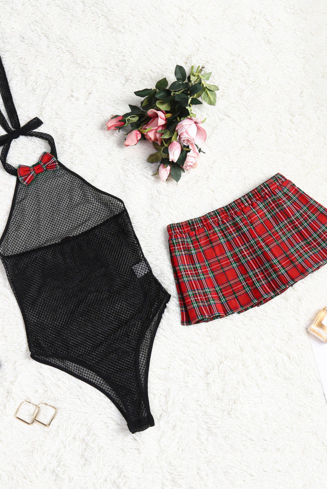 Black fishnet halter bodysuit with red plaid mini skirt. Sexy lingerie set for women from Avidlove.