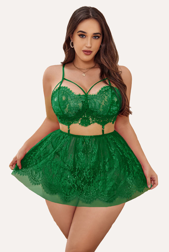 Plus size emerald green lace babydoll lingerie with strappy bralette and sheer skirt.