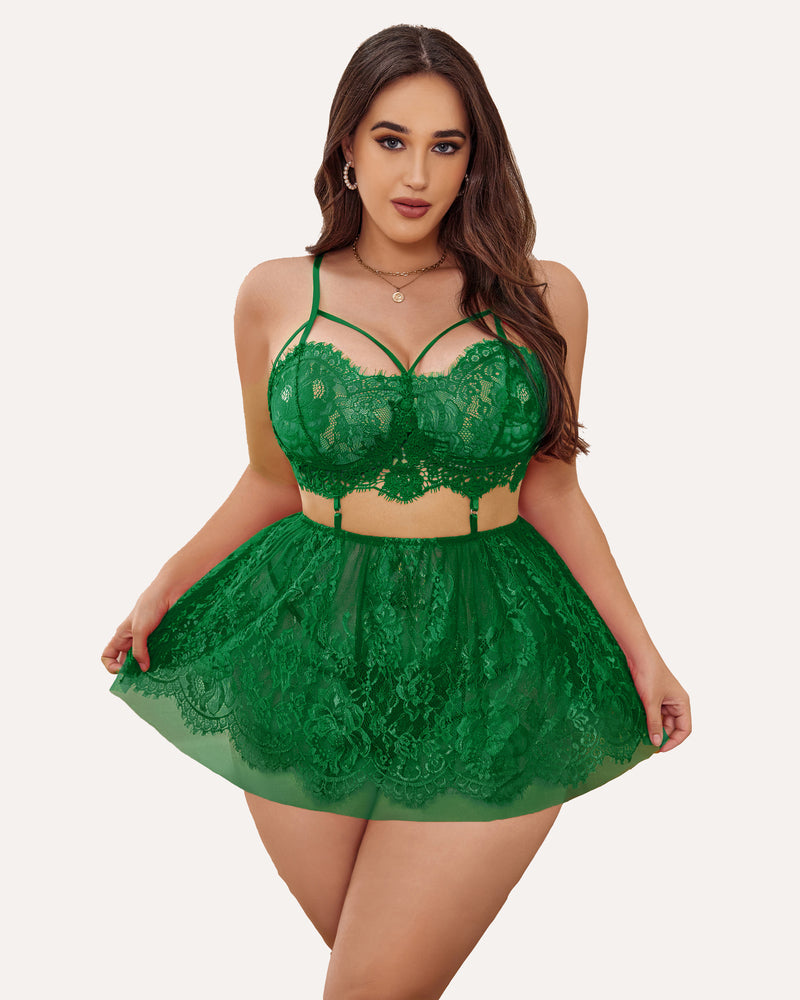 Plus size emerald green lace babydoll lingerie with strappy bralette and sheer skirt.