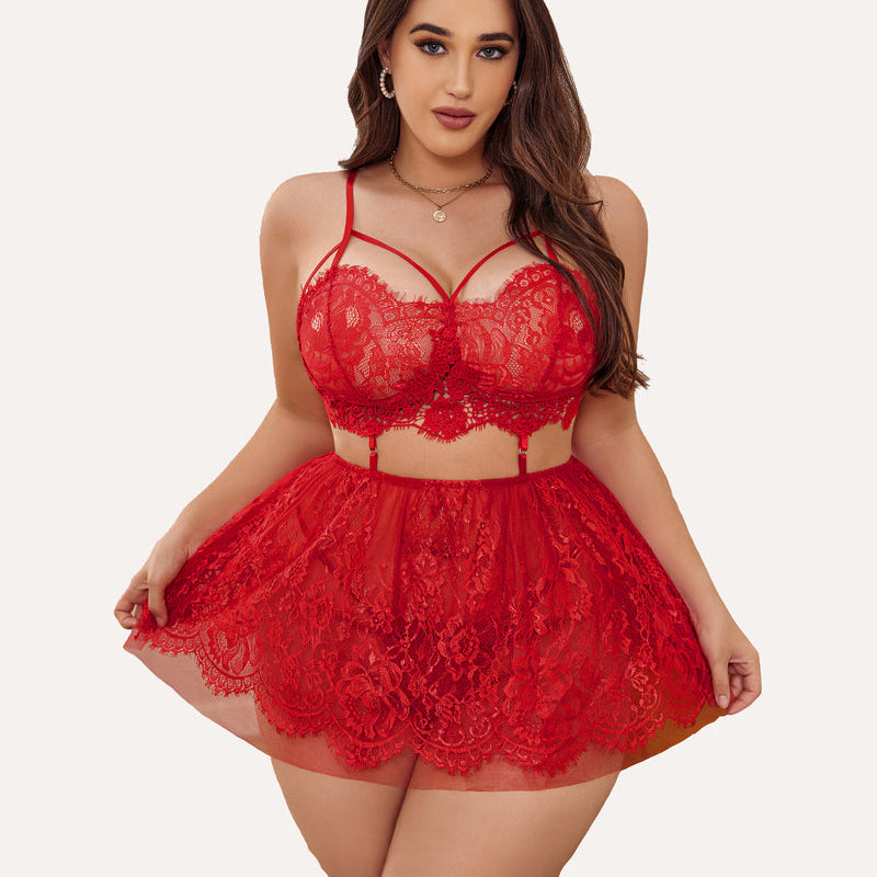 Plus size red lace babydoll lingerie set with strappy bralette and sheer skirt, flattering fit.