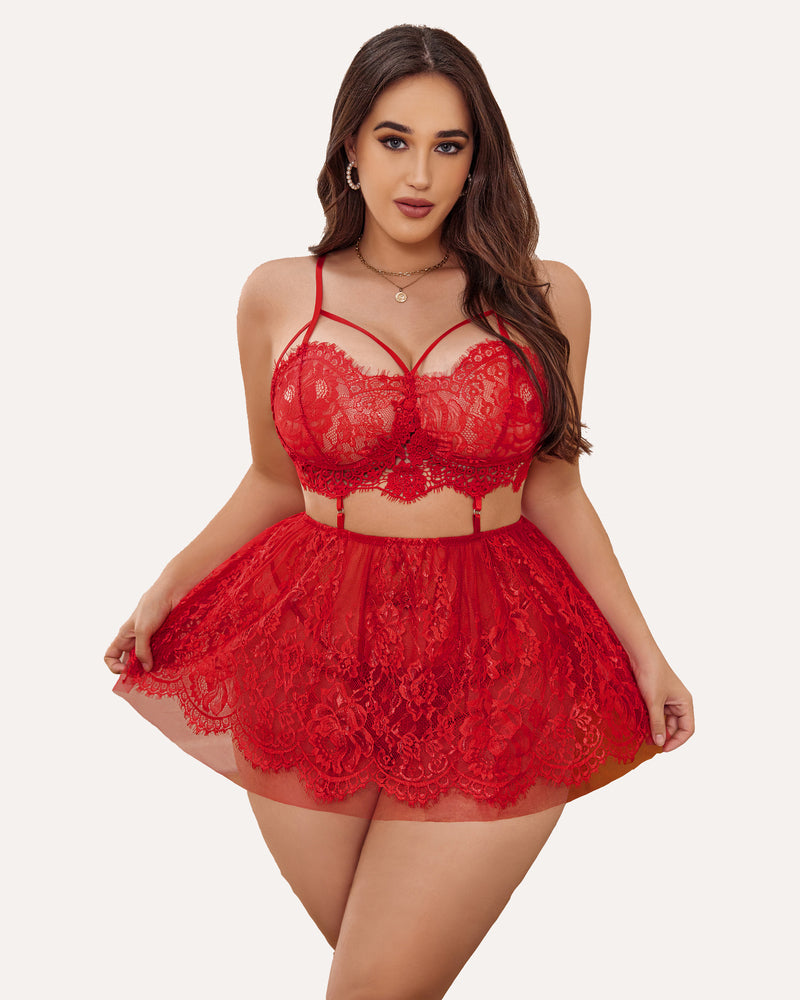 Plus size red lace babydoll lingerie set with strappy bralette and sheer skirt, flattering fit.