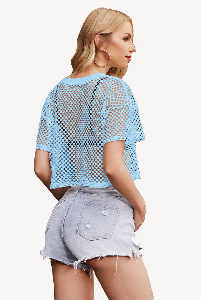 Blue fishnet crop top with denim shorts. Sexy and fashionable see-through top by Avidlove.