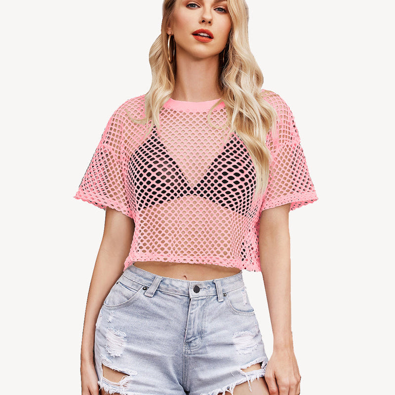 Pink sheer fishnet crop top with denim shorts. Sexy and fashionable lingerie.
