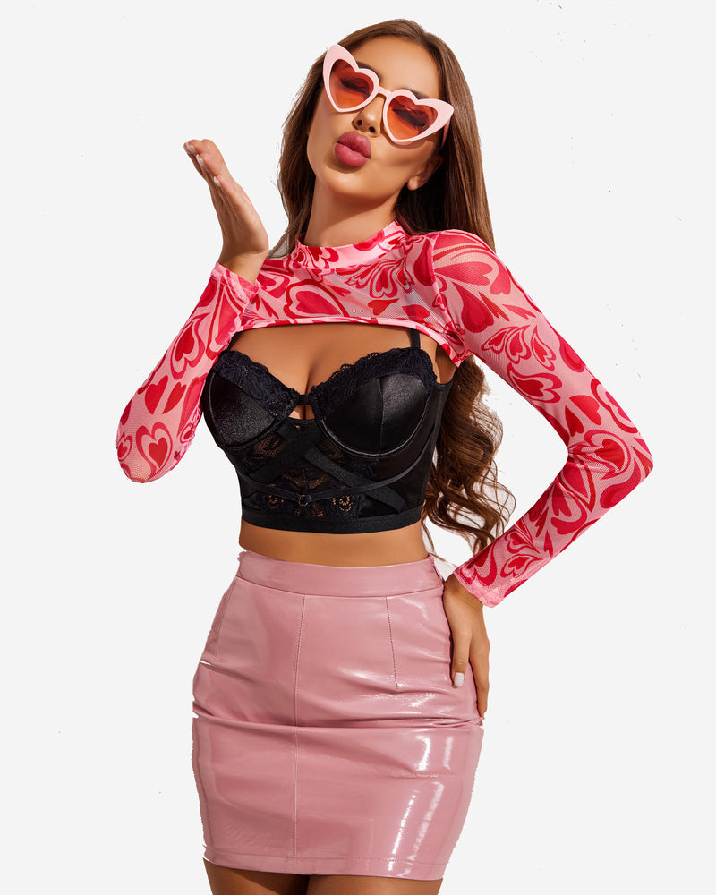 Pink heart-patterned mesh crop top with black bra and pink skirt, stylish and sexy lingerie look