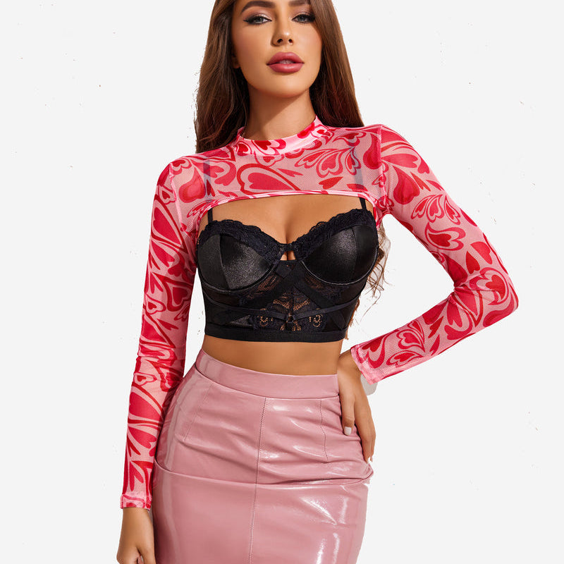Red heart pattern see-through crop top with black bra and pink mini skirt. Sexy, confident look.