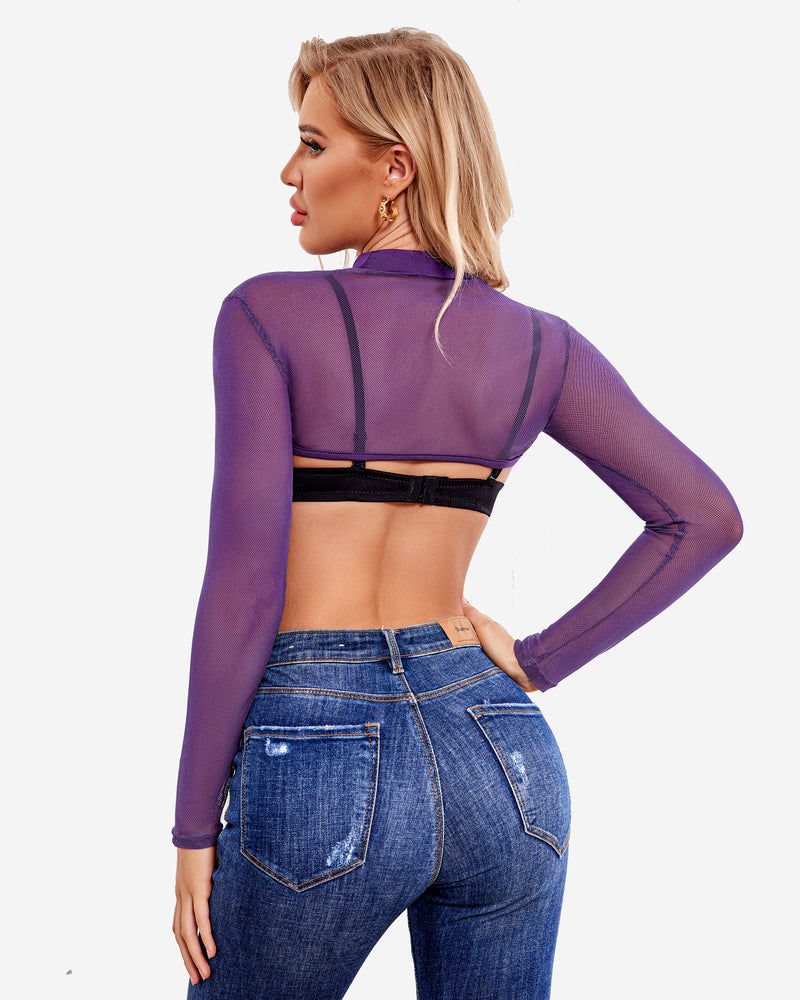 Purple mesh crop top, black bra, blue jeans. Confident, sexy lingerie style.