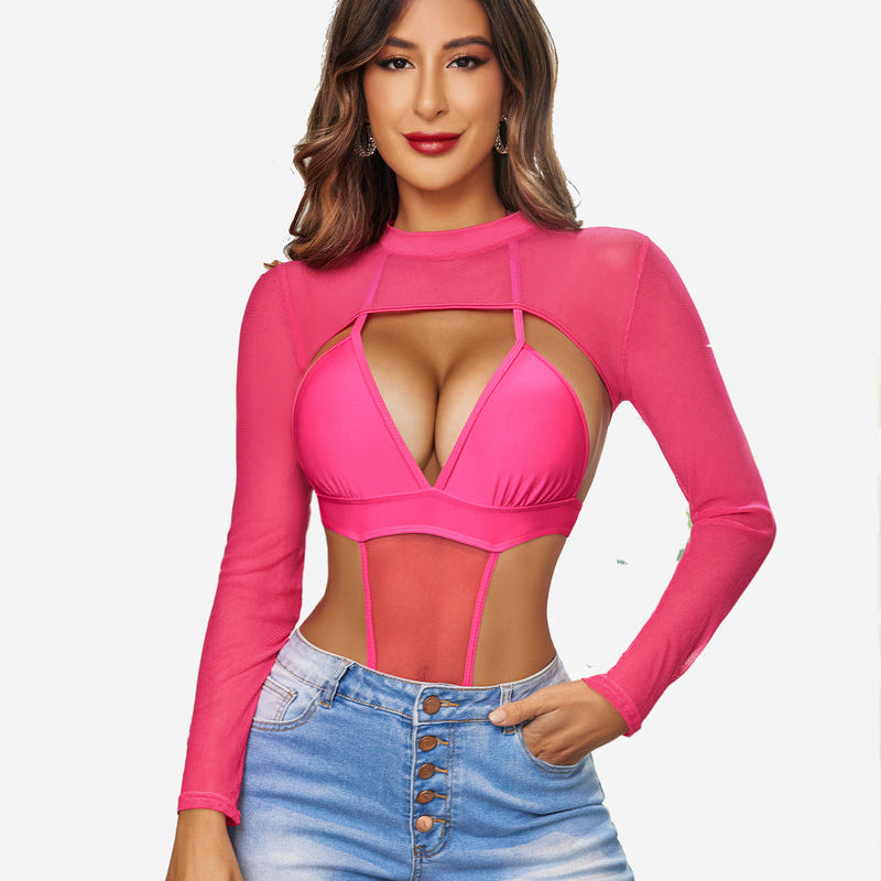 Pink mesh mock neck crop top with keyhole design, long sleeves, and jeans. Confident lingerie style.