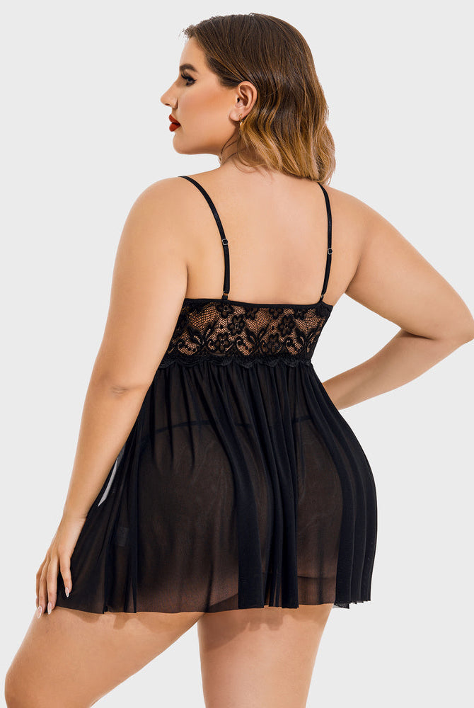 Black lace babydoll lingerie, plus size with adjustable straps and high slit, for confident women.