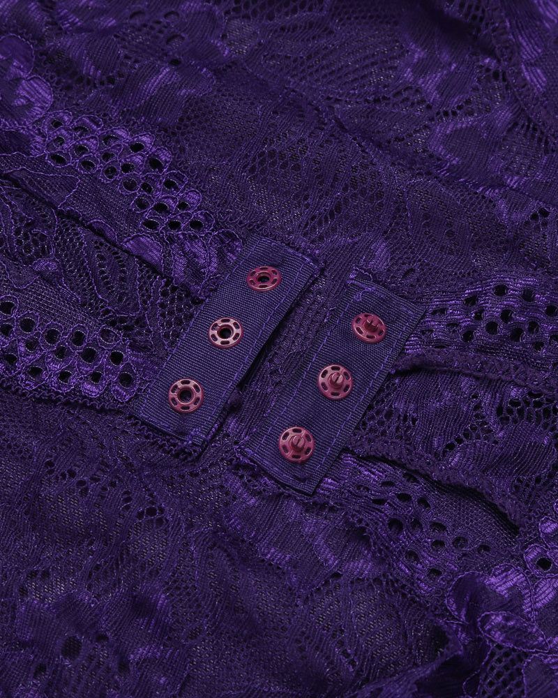 Purple lace plus size babydoll snap crotch detail, highlighting the satin strap and lace fabric