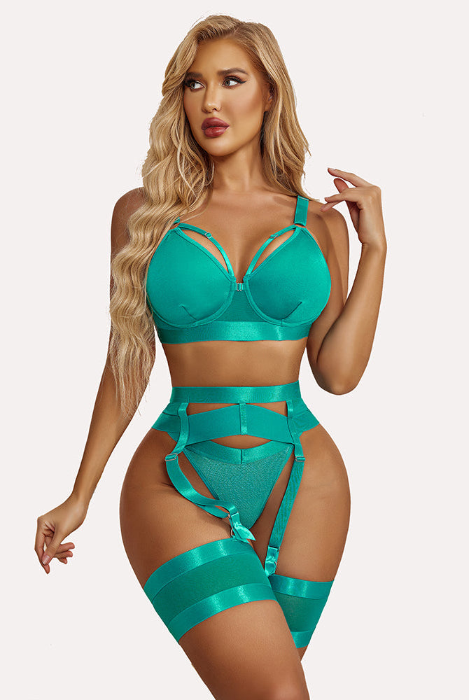 Teal push-up lingerie set: bra, garter belt, and thigh garters. Enhancing femininity and curves.