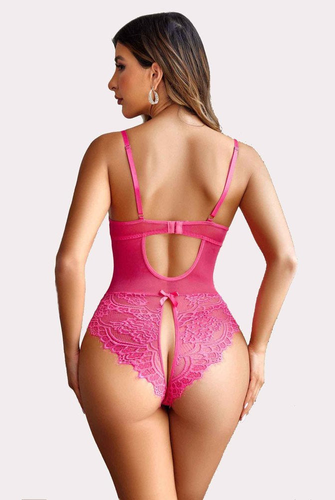 Pink lace harness bodysuit, cut-out and criss-cross detail. Sensual lingerie design, Avidlove.