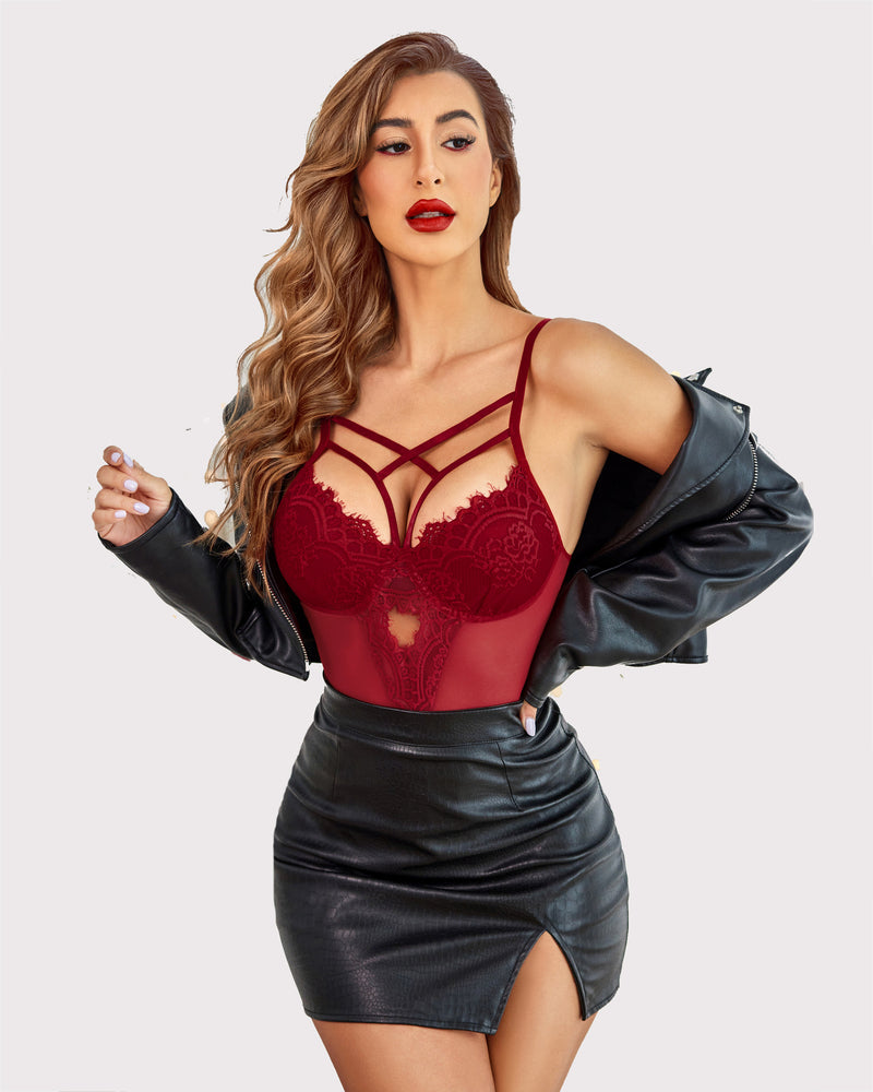 Burgundy floral lace harness bodysuit, criss-cross straps, and leather skirt. Sexy lingerie.