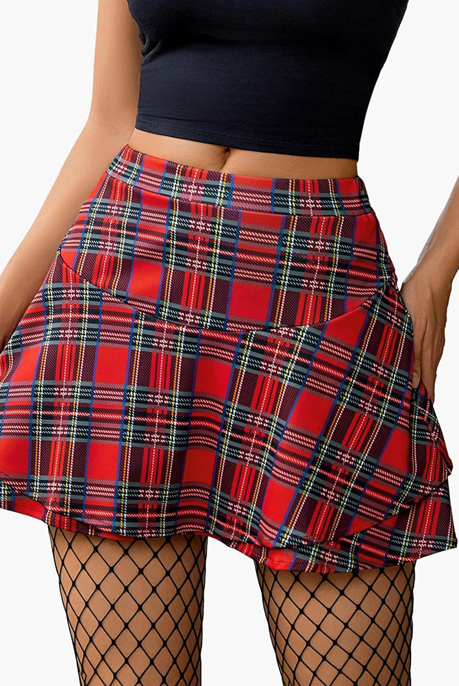 Red plaid mini skirt with ruffle hem and A-line silhouette. Cute and fashionable style.