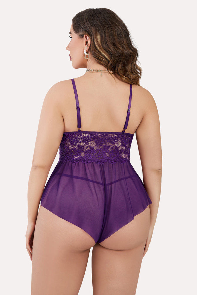 Plus size purple lace teddy bodysuit with adjustable straps and ruffle trim.
