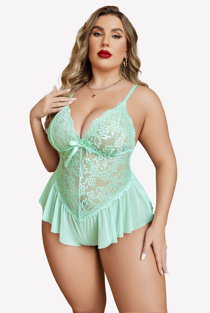Plus size mint green lace bodysuit with adjustable straps, featuring floral lace and ruffle skirt.